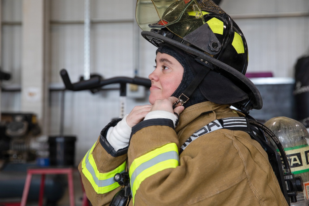 U.S. Army Firefighters conduct downed firefighter rescue training