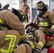 U.S. Army Firefighters conduct downed firefighter rescue training