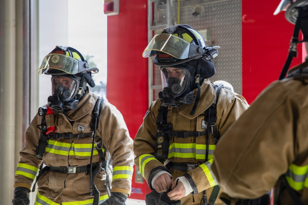 U.S. Army Firefighters conduct downed firefighter rescue training