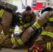 U.S. Army Firefighters conduct downed firefighter rescue training