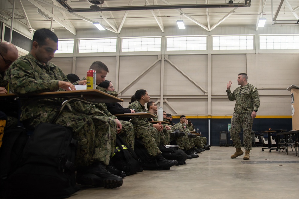 Lt. Rockrohr Conducts Chaplain Services Brief with new SWESC Students