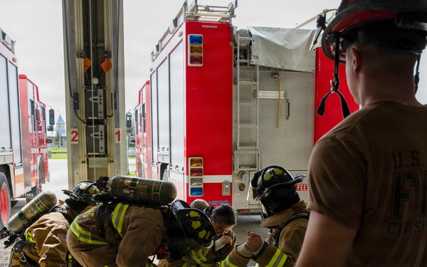U.S. Army Firefighters conduct downed firefighter rescue training