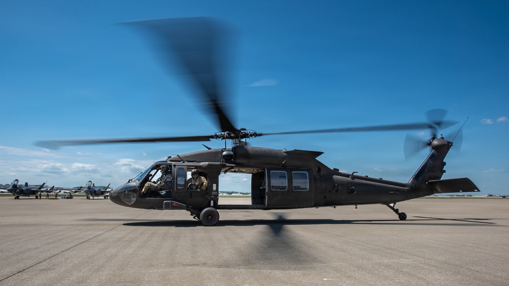 Military aircraft practice at Kentucky Air Guard Base for Thunder Over Louisville air show