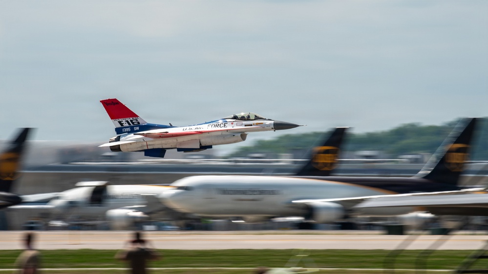 Military aircraft practice at Kentucky Air Guard Base for Thunder Over Louisville air show