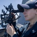 U.S Sailors stand a bridge aboard USS Delbert D. Black (DDG 119)