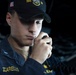 U.S Sailors stand a bridge aboard USS Delbert D. Black (DDG 119)
