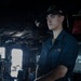 U.S Sailors stand a bridge aboard USS Delbert D. Black (DDG 119)