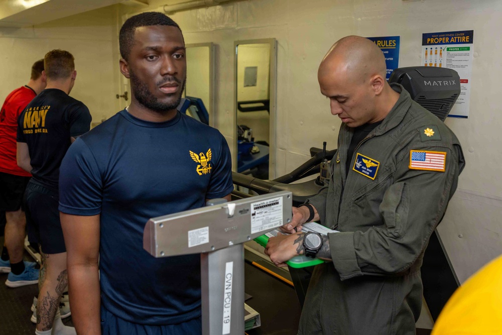 John F. Kennedy Conducts Body Composition Assessment