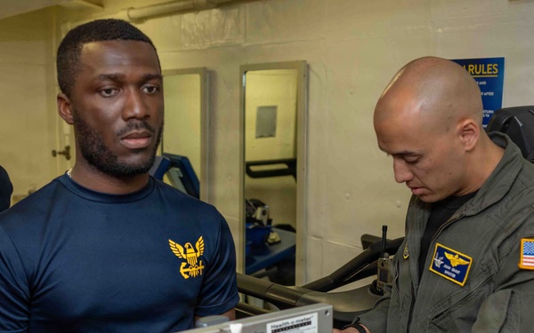 John F. Kennedy Conducts Body Composition Assessment