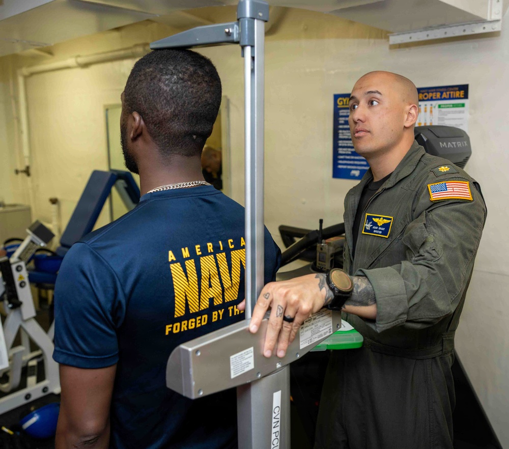 John F. Kennedy Conducts Body Composition Assessment