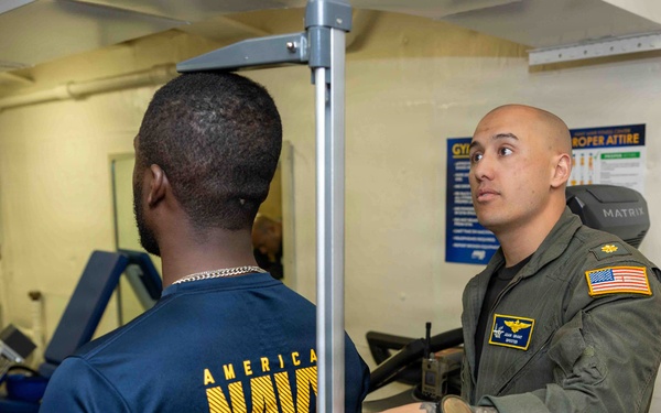 John F. Kennedy Conducts Body Composition Assessment