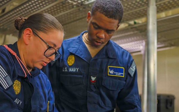 PCU John F. Kennedy Sailors Conduct Firearm Maintenance