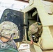 Soldiers clear the vehicle and pull security during training