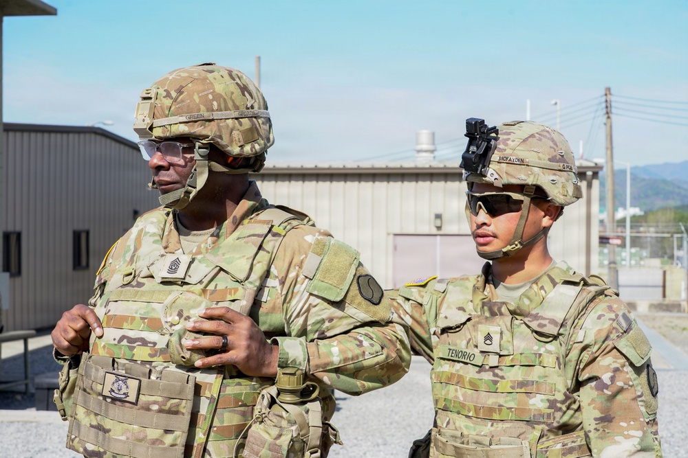 Senior leadership receive a briefing on range operations before qualification