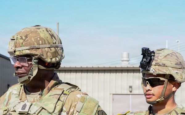 Senior leadership receive a briefing on range operations before qualification