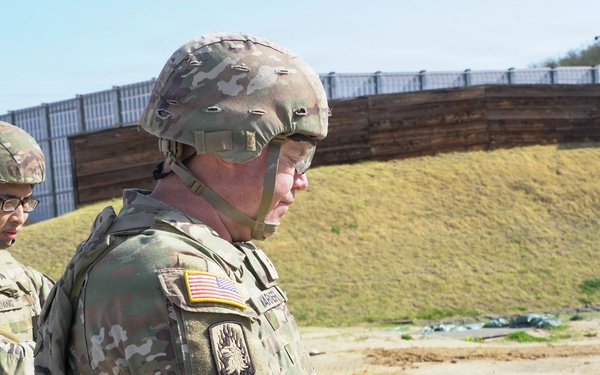 Soldier conducts M17 pistol functions check during qualification at Carroll Range