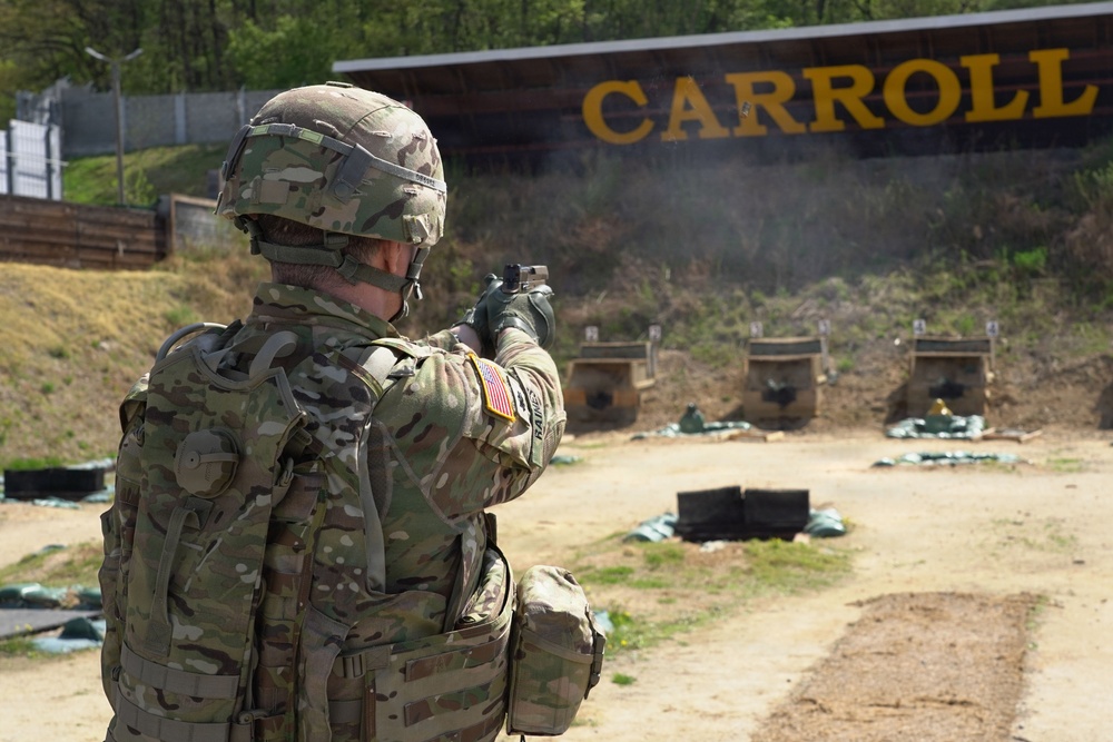 Soldiers engage targets with M17 pistols during live-fire qualification