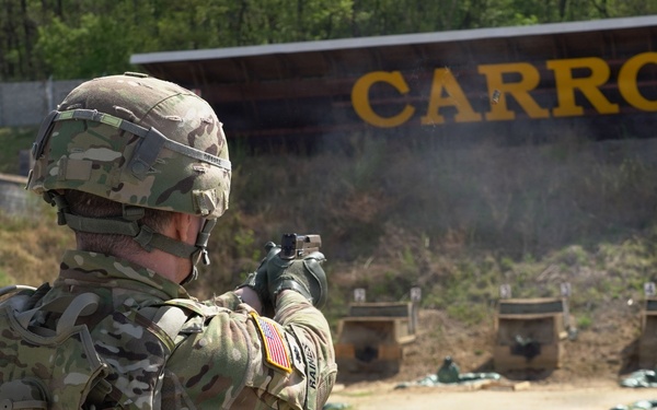 Soldiers engage targets with M17 pistols during live-fire qualification