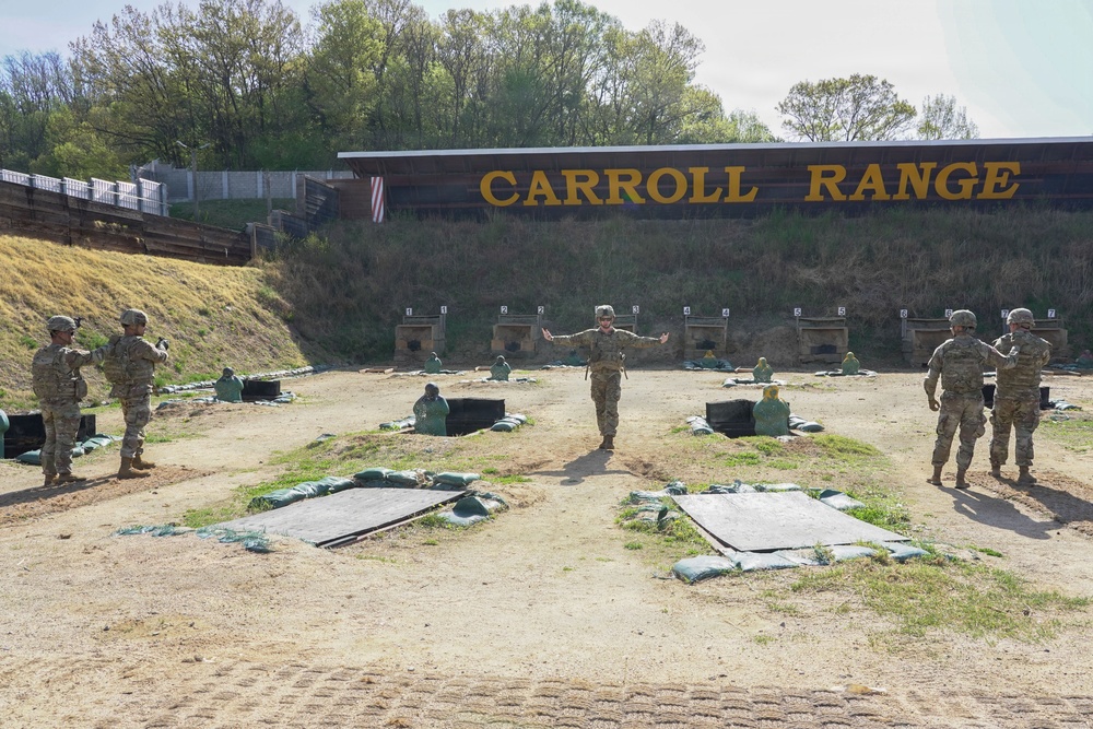 Soldiers receive a range brief before stepping onto the firing line