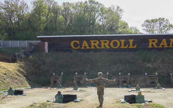 Soldiers receive a range brief before stepping onto the firing line