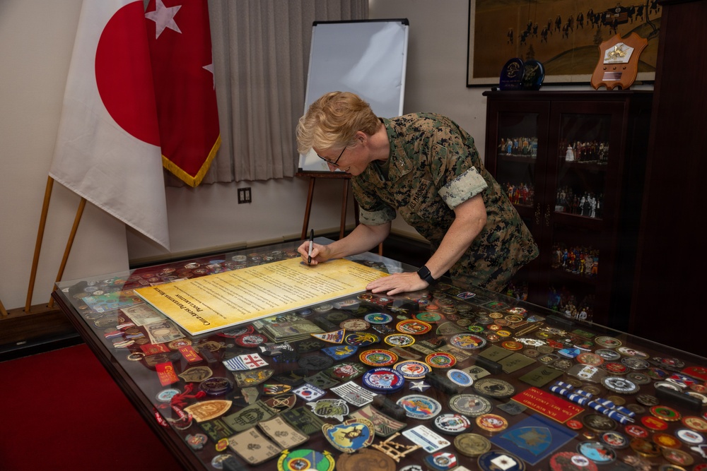 Col. Karin Fitzgerald signs the Child Abuse Prevention Month Proclamation
