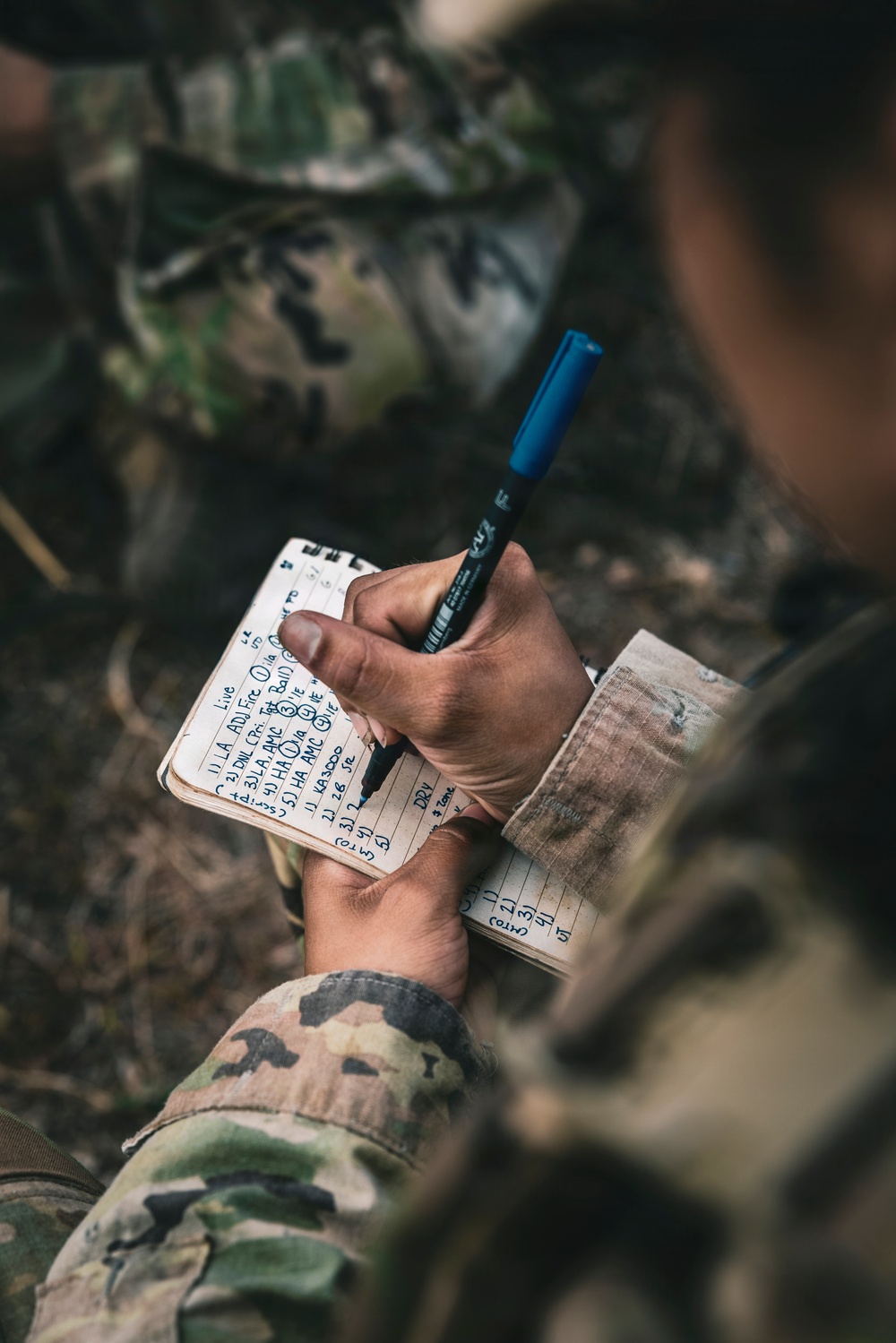 U.S. Army Fire Support Team observes HIMARS live fire