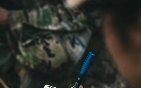 U.S. Army Fire Support Team observes HIMARS live fire