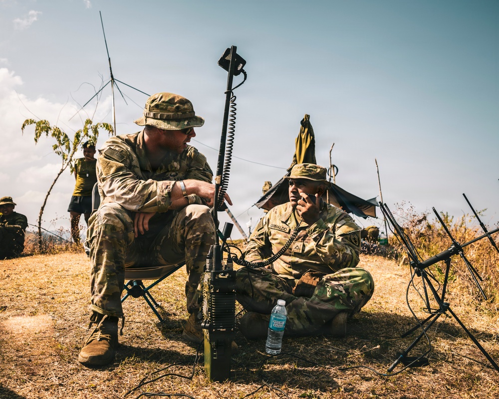 U.S. Army Fire Support Team observes HIMARS live fire