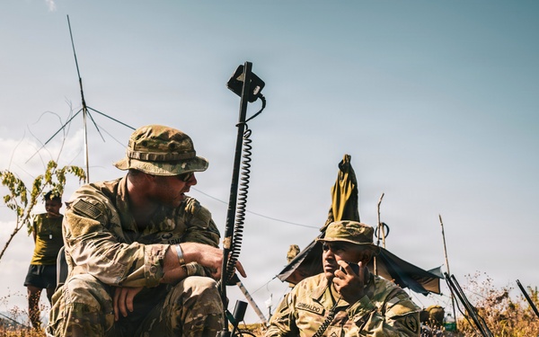 U.S. Army Fire Support Team observes HIMARS live fire