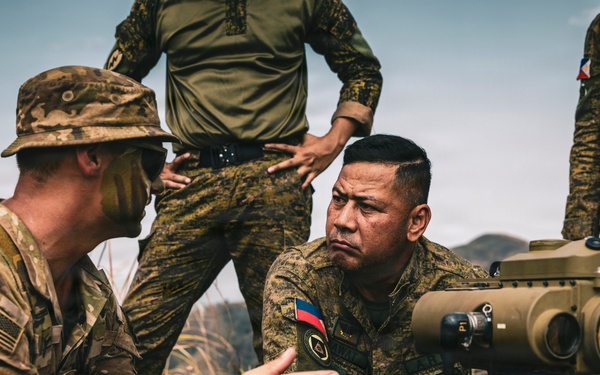 U.S. Army Fire Support Team observes HIMARS live fire