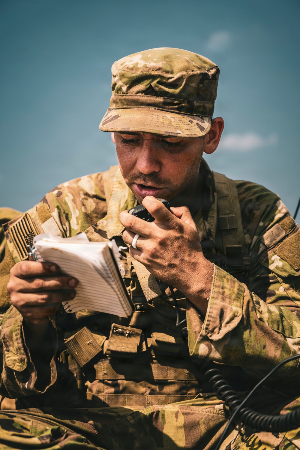 U.S. Army Fire Support Team observes HIMARS live fire
