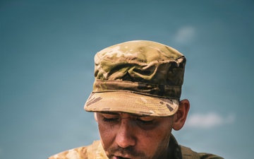 U.S. Army Fire Support Team observes HIMARS live fire