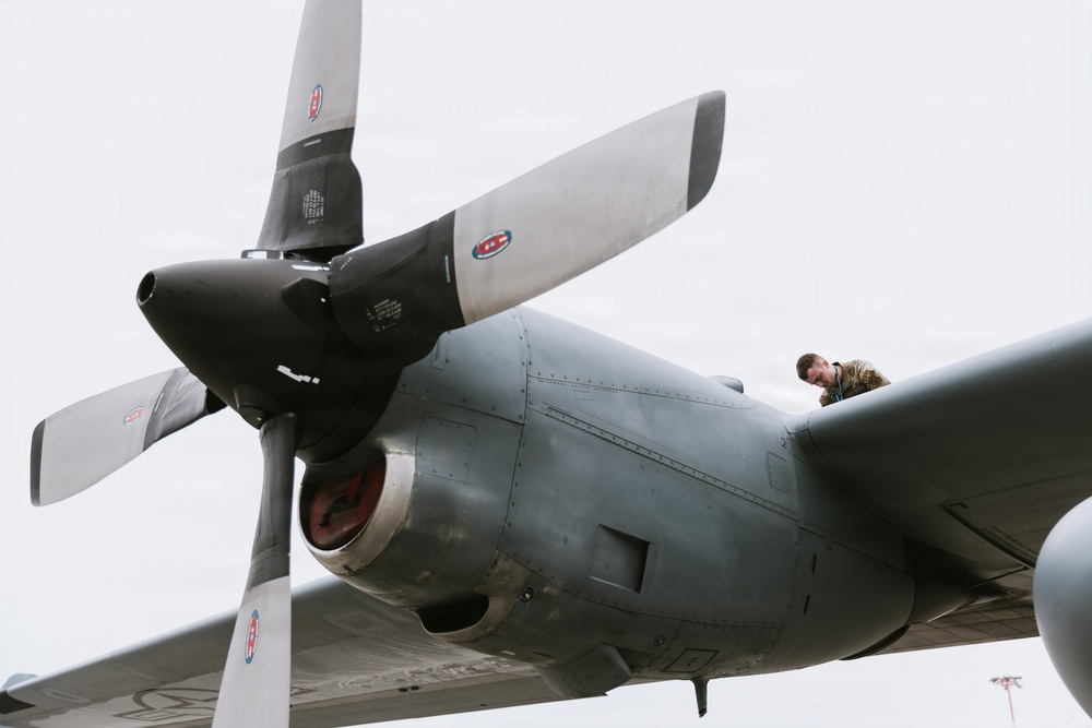 Airmen conduct a Basic Post-Flight Inspection