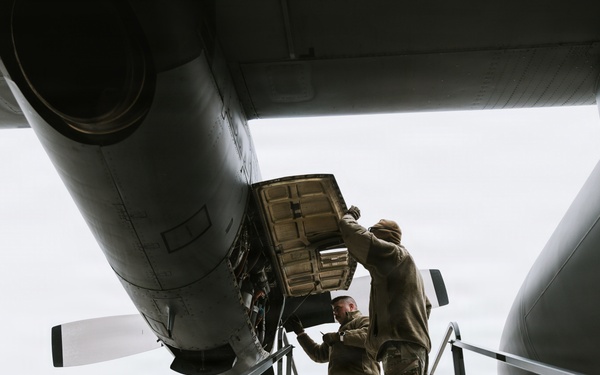 Airmen conduct a Basic Post-Flight Inspection