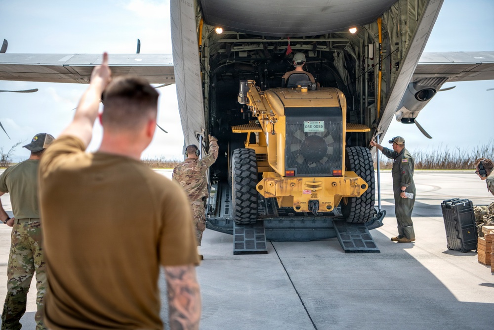 374 AW delivers essential supplies after Typhoon Sinlaku