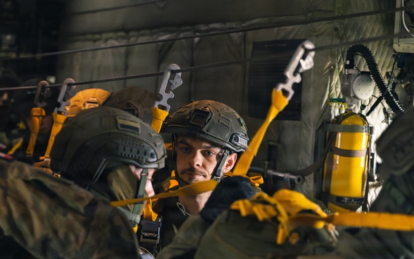 Polish Allies jump from a 139th Airlift Wing C-130H Hercules