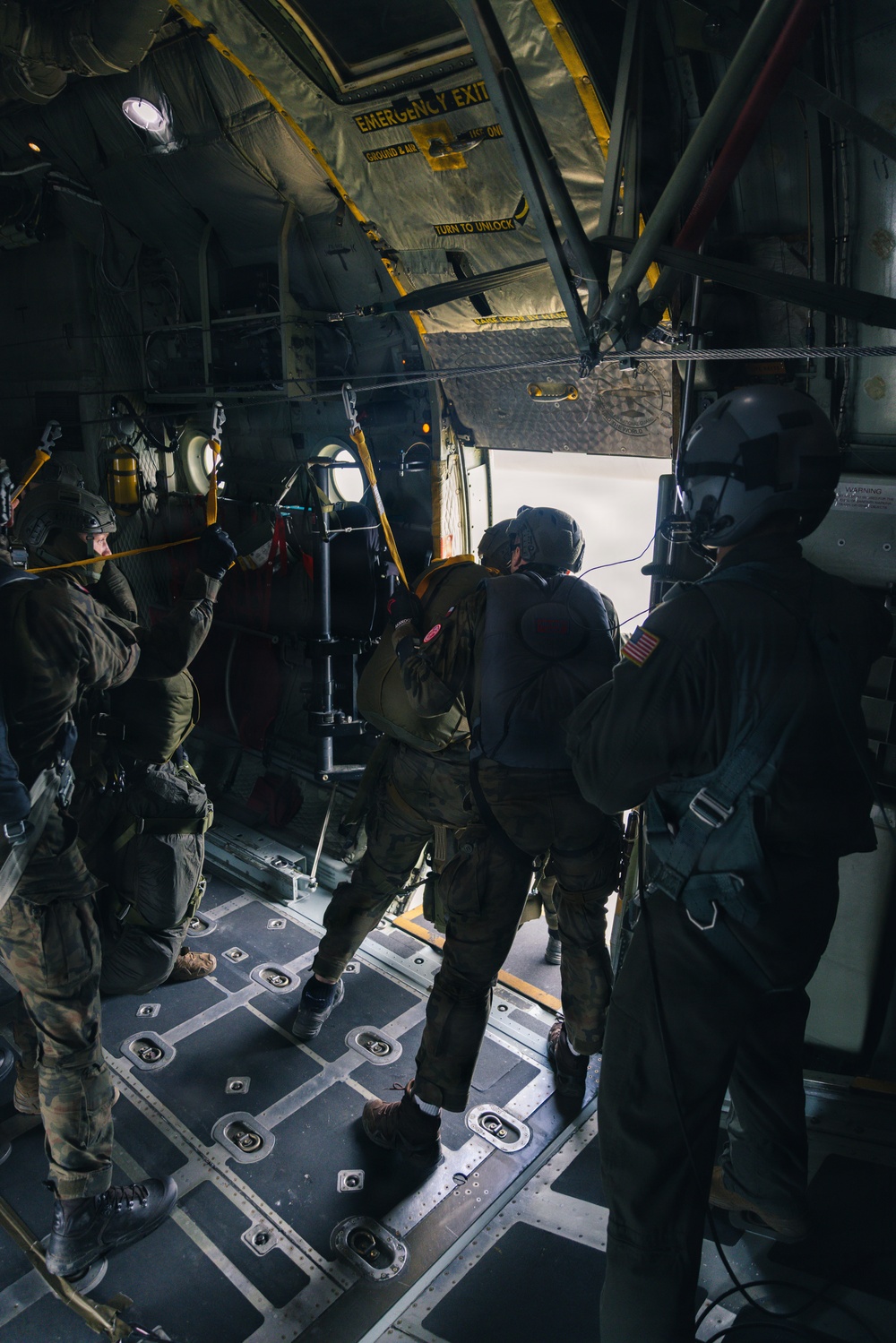 Polish Allies jump from a 139th Airlift Wing C-130H Hercules