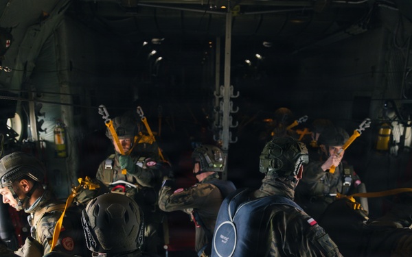 Polish Allies jump from a 139th Airlift Wing C-130H Hercules