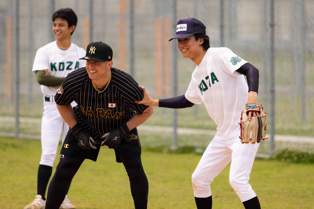 MAG-36 Marines compete with local university students in baseball