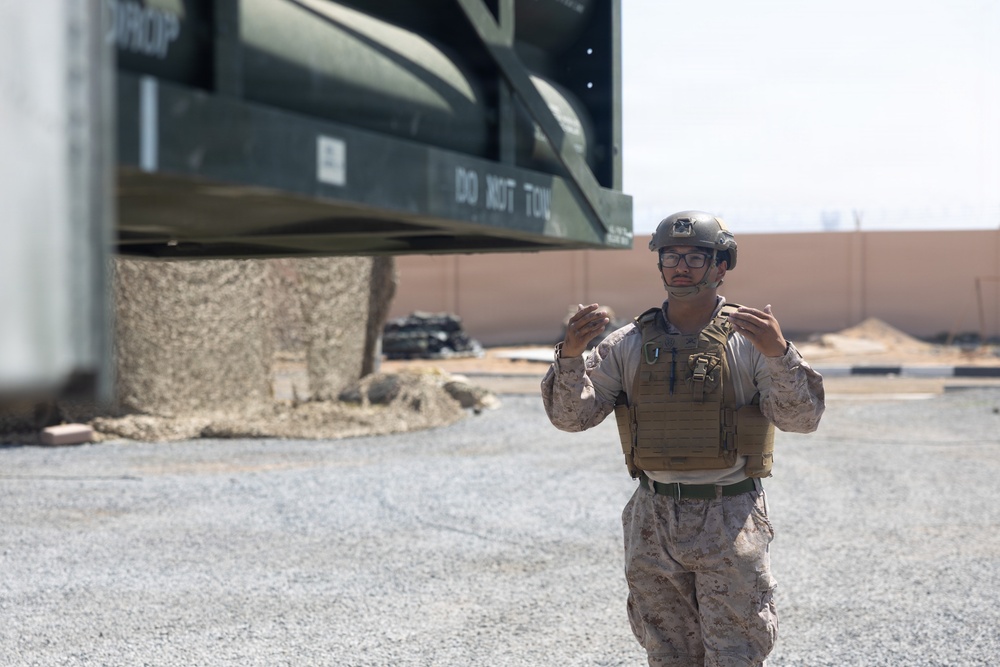 U.S. Marines with Echo 2/10 clean M142 HIMARS
