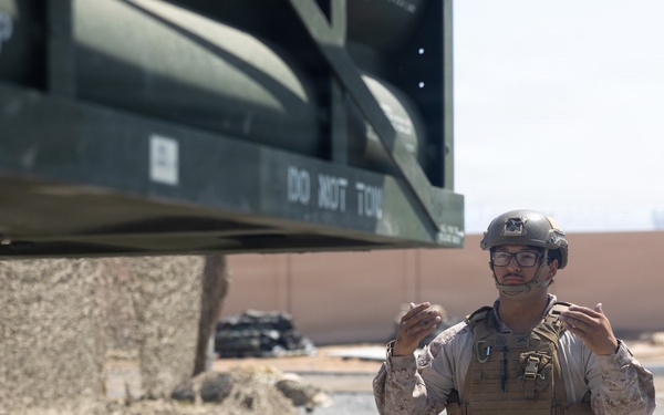 U.S. Marines with Echo 2/10 clean M142 HIMARS