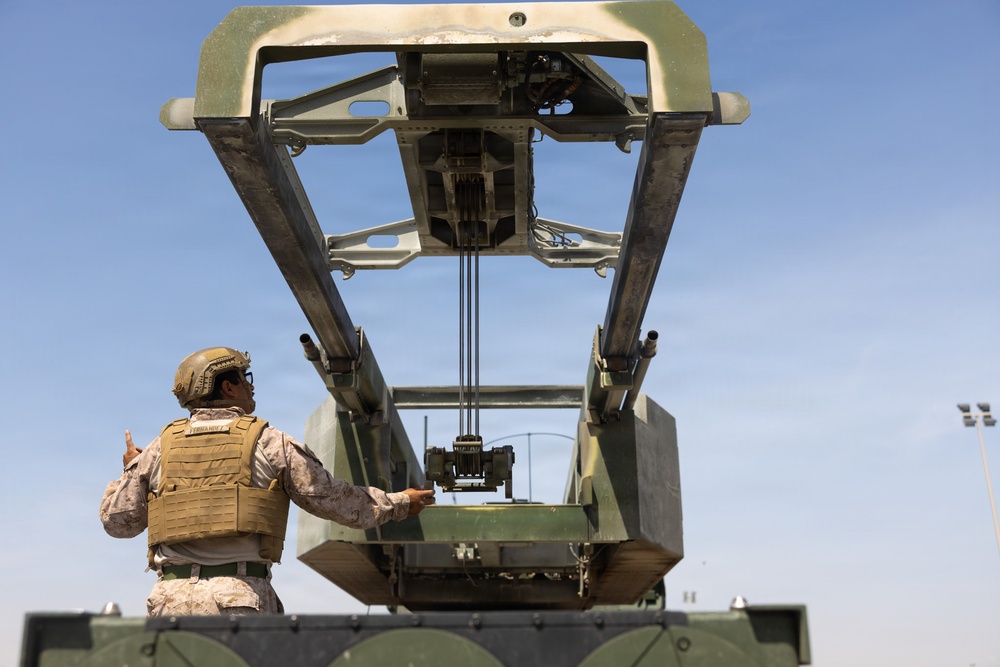 U.S. Marines with Echo 2/10 clean M142 HIMARS