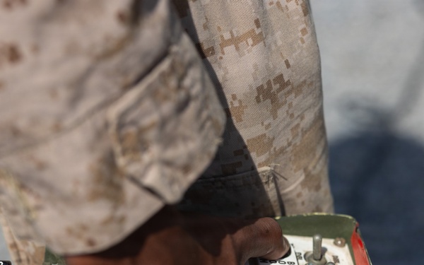 U.S. Marines with Echo 2/10 clean M142 HIMARS