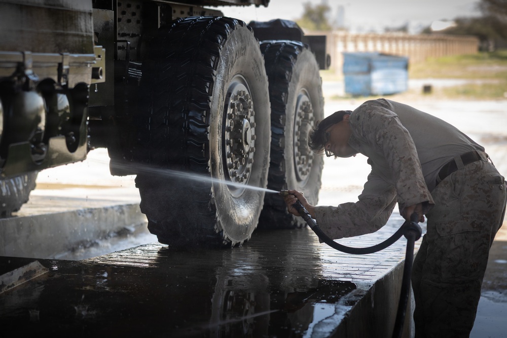 U.S. Marines with Echo 2/10 clean M142 HIMARS