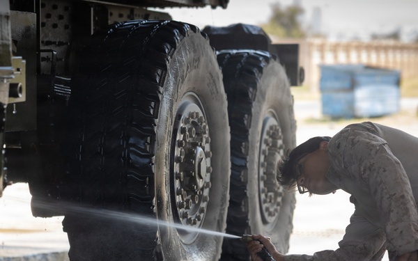 U.S. Marines with Echo 2/10 clean M142 HIMARS
