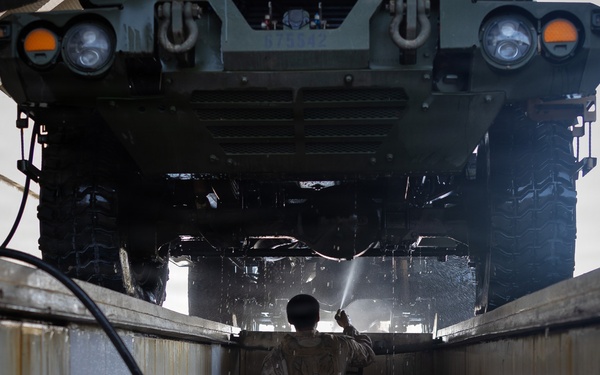 U.S. Marines with Echo 2/10 clean M142 HIMARS