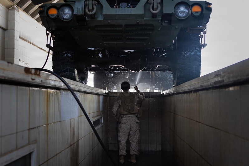 U.S. Marines with Echo 2/10 clean M142 HIMARS