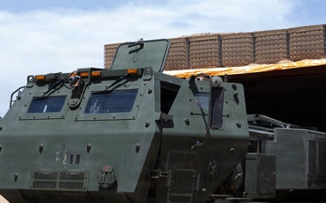 U.S. Marines with Echo 2/10 clean M142 HIMARS