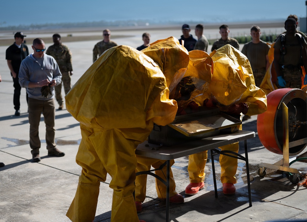 325th CES firefighters participate in hazardous material leak training