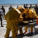 325th CES firefighters participate in hazardous material leak training